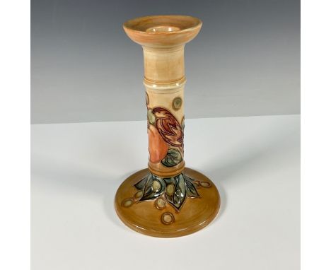 This vintage Moorcroft pottery candlestick, standing at 8.25"H, is part of the Juneberry pattern, which features vibrant hand