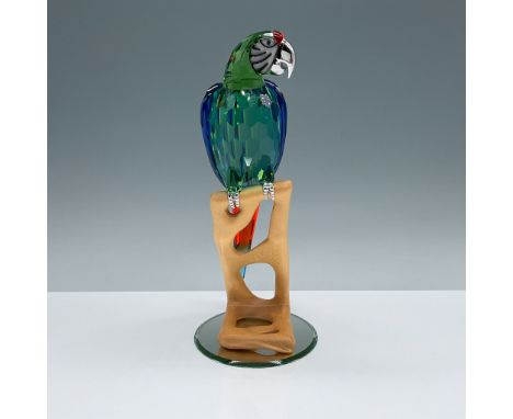 This vibrant and intricately designed Swarovski Crystal Macaw figurine captures the brilliance of Austrian crystal artistry. 