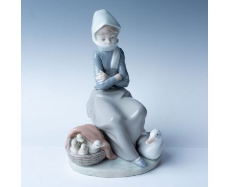 Lladro porcelain figurine titled "Girl with Ducks," model number 1001267, handcrafted in Spain. This delicate piece features 