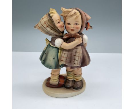 Adorable Goebel Hummel figurine titled "Telling Her Secret," depicting two children sharing a heartwarming secret. This colle