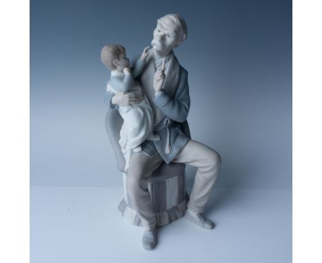 This Lladro porcelain figurine titled The Grandfather (number 01014654) features intricate craftsmanship. Standing 11.75"H, t