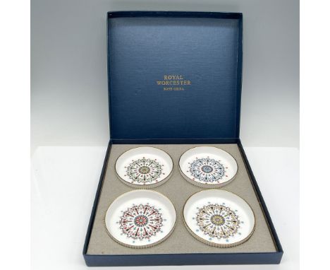 Set of 4 hand painted center design in vibrant colors of blue, red and black with gilt banded edge. Royal Worcester backstamp