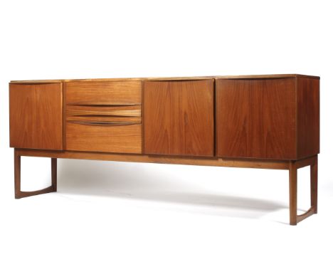 A 1960s teak sideboard, probably AH McIntosh. With twin cupboard doors enclosing a shelf, centred by two drawers and a cutler