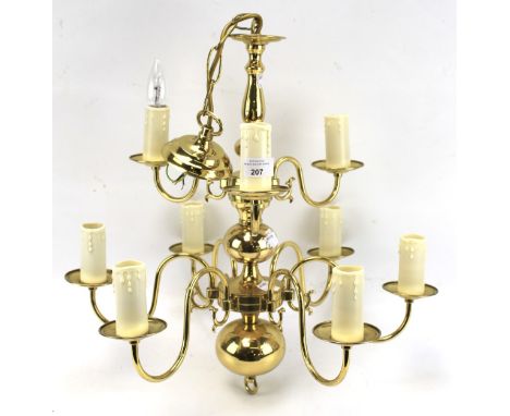 A 20th century brass nine light chandelier in the antique Dutch style with two tiers. L52cm 