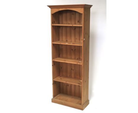 A five shelf pine bookcase. Measuring L72cm x D31cm x H180cm