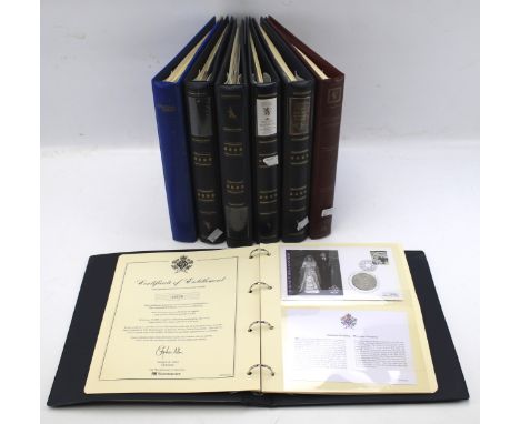 The Great Britain stamp collection, together with six commemorative first day cover albums.