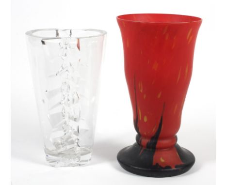 A 20th century red and black opaque glass vase and a Nachtmann moulded clear glass vase. The first of flared form with marble