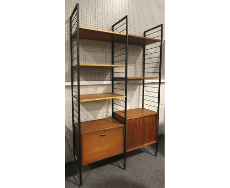 A three-rack Ladderax unit. With five adjustable wooden shelves, a cupboard with sliding door and glass shelf, another with f