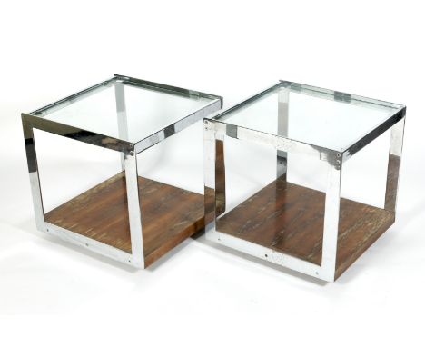 A pair of circa 1970s Merrow Associates glass topped, rosewood and chrome side tables. Of square section, with lower rosewood