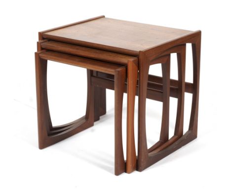 A G-Plan nest of three teak Quadrille occasional tables. Designed by R Bennett, each of rectangular form, the largest L53.5cm