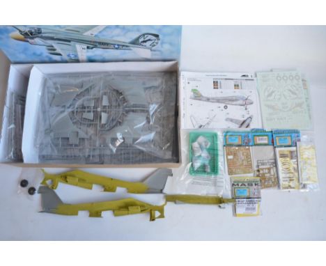 Two 1/32 scale Grumman A-6 Intruder model kits from Trumpeter to include an A-6A (model has been started with painting to int
