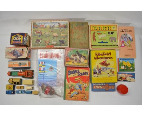 Collection of vintage toys to include games, puzzles, books, vehicle models including a boxed Fordson Dexta tractor from Cres