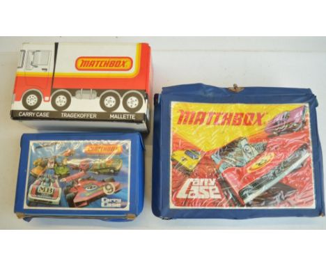 Three vintage Matchbox carry cases for model cars with contents (please refer to photos), one handle intact