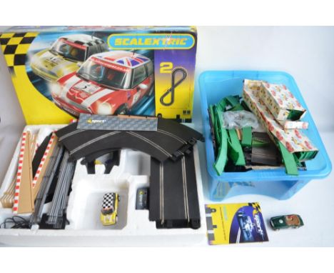 Modern Scalextric John Cooper Challenge set, missing one Mini (remaining Mini missing a tyre) and a box of track and other ac