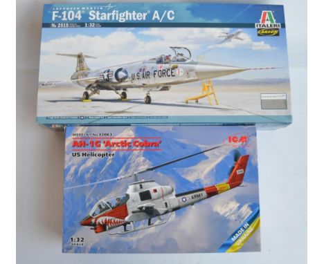 Two 1/32 scale plastic model kits to include an Italeri Lockheed F-104A/C Starfighter and an ICM Bell AH-1G 'Arctic Cobra' he