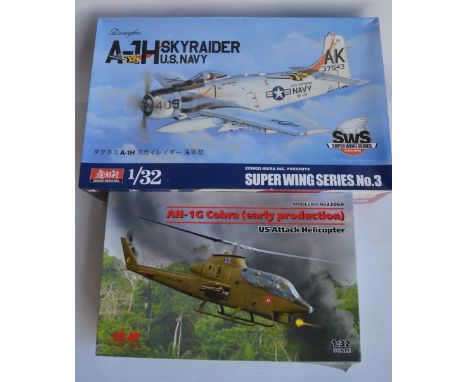 Two unbuilt 1/32 scale Vietnam War era plastic model kits to include a Zoukei-Mura Douglas A-1H Skyraider (sprues factory sea