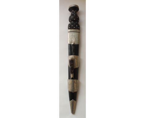 Circa 19th century Scottish dirk, 11.5" part double edged blade, traditional knot carved grip with metal studs, complete with