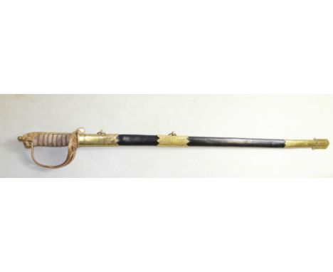 Royal Naval Officers Dress Sword. Blade embossed with Anchor, Crown, George V Cypher. Brass hand guard and Lion pommel, shagr
