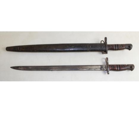 1913 US Bayonet with scabbard, 1917 US Bayonet, lacking scabbard. Both by Remington