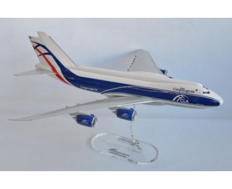Unusual desktop display model in 1/100 scale (approximately) by Lupa Models including right side Boeing 747-8F and left side 