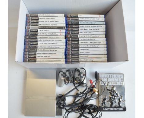 Play Station 2 with one controller and a collection of games, mostly first person perspective war games to include Call Of Du