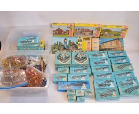 Collection of Marklin 3 rail HO gauge track including boxed packs, also included empty track boxes, 2 transformers, connector