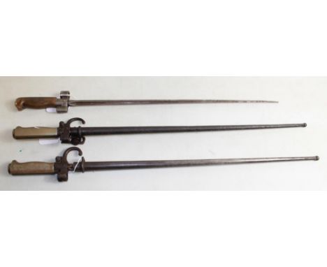 Three early French Lebel bayonets, model 1886, one lacking scabbard