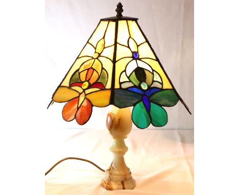 Tiffany style lamp on a turned onyx base, H: 50 cm. Not available for in-house P&amp;P, contact Paul O'Hea at Mailboxes on 01