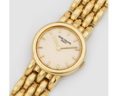 aus den 90er Jahren Gelbgold, gest. 750. Rundes Uhrengehäuse, cremefarbenes Zifferblatt mit Gold-Stabindexen und Zeigern. Bre