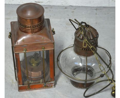 A copper ship's style lamp, height 36cm and a similar copper and glass ceiling pendant, height 35cm (2).
