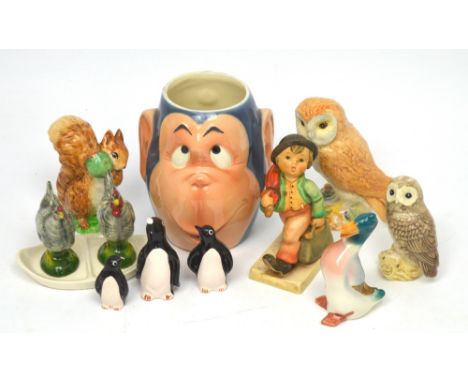 Two Beswick owls, a Beswick Beatrix Potter figure, 'Squirrel Nutkin', a Goebel/Hummel cruet set modelled as two cockerels, a 