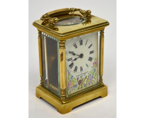 A Mappin & Webb Ltd of London brass carriage clock, the painted dial set with Roman numerals and floral decoration, height 12