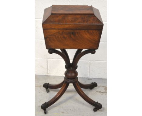 A 19th century large walnut sarcophagus tea caddy, four interior compartments, one with partial lead lining, lacking mixing b