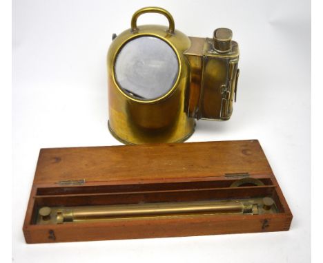 A boxed G Lee & Son 'The Hard Portsmouth Slide Rule', length 46cm and a brass binnacle compass cover (2).