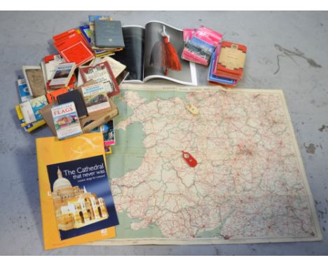 A quantity of vintage road maps to include linen examples, various travel books, 'The Observers Book of Flags' etc.