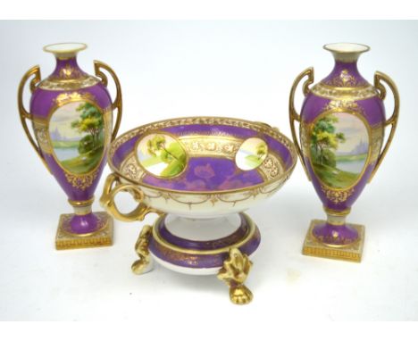 A purple ground gilt-heightened Noritake trio comprising pair of twin-handled baluster vases raised on square-sectioned bases