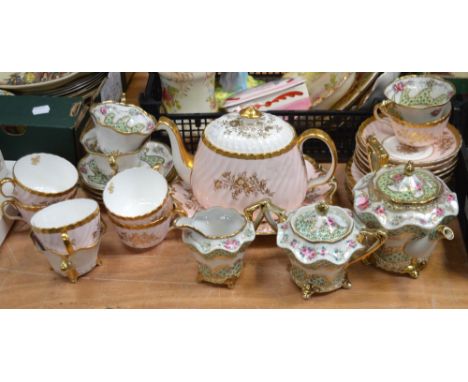 A Minton twenty-piece gilt tea service, salmon pink ground with floral decoration and a Noritake ten-piece part tea service, 