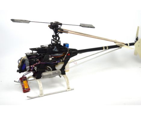 A vintage c1960 model helicopter with Irvine Voltspy engine, length approx 98cm.