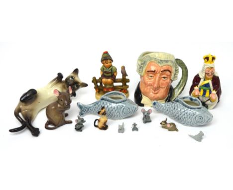Royal Doulton D6504 'The Lawyer', a Beswick 'King of Hearts' Alice series figure, a Goebel figure of a boy perched on a fence