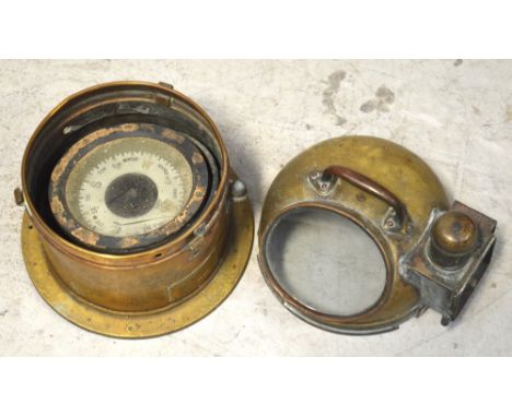 A Sestrel binnacle-type ship's compass housed within brass case.   CONDITION REPORT  Diameter at bottom of case 24cm, weather