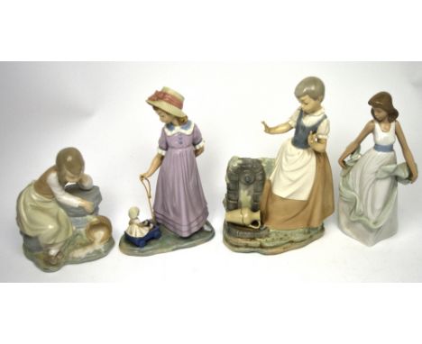 A Lladró figure group, a young girl playing with a doll in a cart, a Nao figure group, a girl who has dropped her jug whilst 