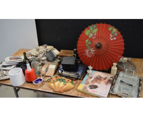 A collectors' lot comprising silver plated items to include a candelabrum, vintage bottles, tins, newspapers, an Oriental par