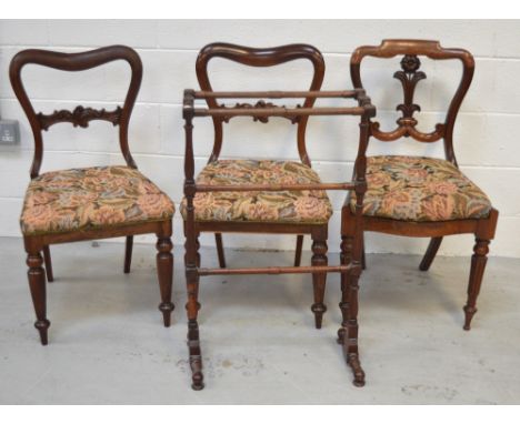 A matched set of three 19th century balloon-back chairs, one with carved floral splat and a vintage clothes maiden (4).