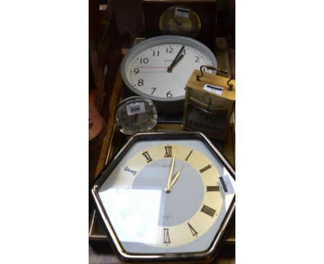 Six modern wall clocks to include a rectangular example, the dial set with star signs, a small retro Big Ben alarm clock, a c