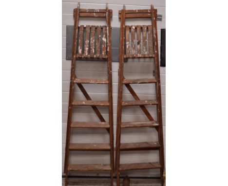 A pair of vintage stepladders, one inscribed 'Sixoff'.