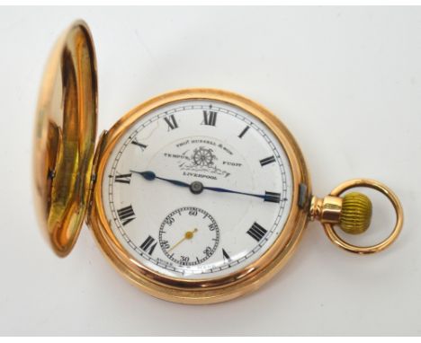 A 9ct yellow gold crown-wind pocket watch inscribed 'Thos Russell & Son, Liverpool', circular white enamel dial set with Roma