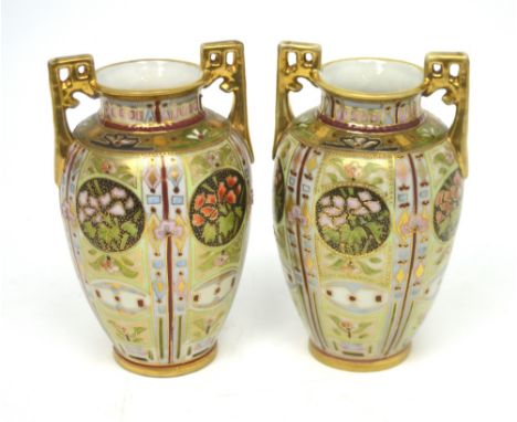 A pair of gilt-heightened twin-handled Noritake baluster vases with geometric and floral vignette decoration, height of each 