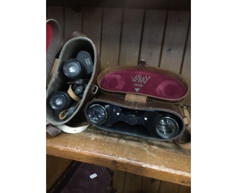 French "Delacroix" Paris binoculars and a vintage Elgee Cadet binoculars, both in cases.  