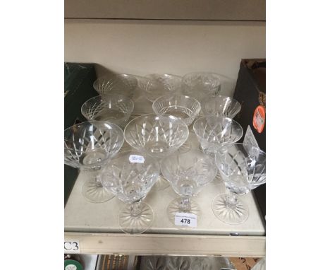 12 assorted patterned Waterford champagne saucers.  