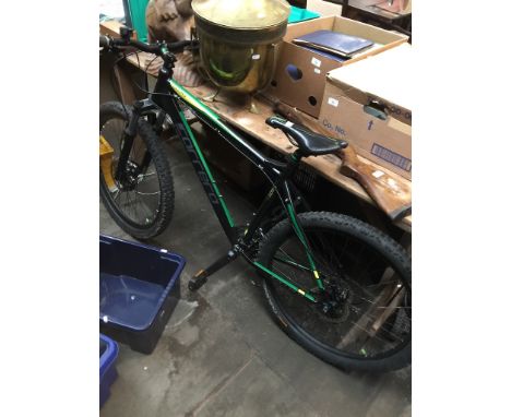 A Carrera Vulcan gents mountain bike, 27 speed shimano gears, hydraulic disk brakes.  
